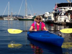 Jill kayaking in the Friday Harbor marina.