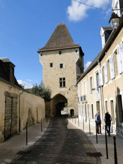 Shopping in Nevers under the shadow of the old city gate