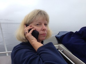 Jill on the phone in a fog